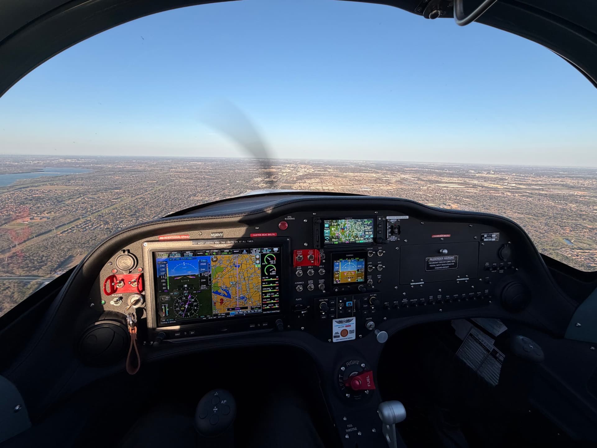 Glass-cockpit view from a Parrish Aviation training aircraft over Dallas, TX